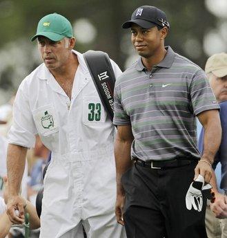 Tiger&nbsp;Woods&nbsp;makes&nbsp;his&nbsp;way&nbsp;to&nbsp;the&nbsp;first&nbsp;tee&nbsp;with&nbsp;caddie&nbsp;Steve&nbsp;Williams&nbsp;during&nbsp;the&nbsp;first&nbsp;round&nbsp;of&nbsp;the&nbsp;Masters&nbsp;golf&nbsp;tournament&nbsp;in&nbsp;Augusta,&nbsp;Ga.&nbsp;on&nbsp;Apirl&nbsp;8,&nbsp;2010.&nbsp;[Agencies]
