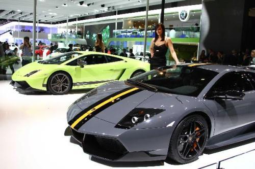 A&nbsp;model&nbsp;poses&nbsp;beside&nbsp;a&nbsp;new&nbsp;Lamborghini&nbsp;car&nbsp;during&nbsp;the&nbsp;media&nbsp;preview&nbsp;at&nbsp;the&nbsp;Beiijng&nbsp;Auto&nbsp;Show&nbsp;on&nbsp;April&nbsp;23,&nbsp;2010.&nbsp;In&nbsp;total,&nbsp;nearly&nbsp;2100&nbsp;companies&nbsp;from&nbsp;16&nbsp;coutries&nbsp;and&nbsp;regions&nbsp;will&nbsp;exhibit&nbsp;during&nbsp;2010&nbsp;Beijing&nbsp;International&nbsp;Automotive&nbsp;Exhibition&nbsp;(Auto&nbsp;China&nbsp;2010)&nbsp;.&nbsp;(Xinhua/Zhang&nbsp;Yanhui)