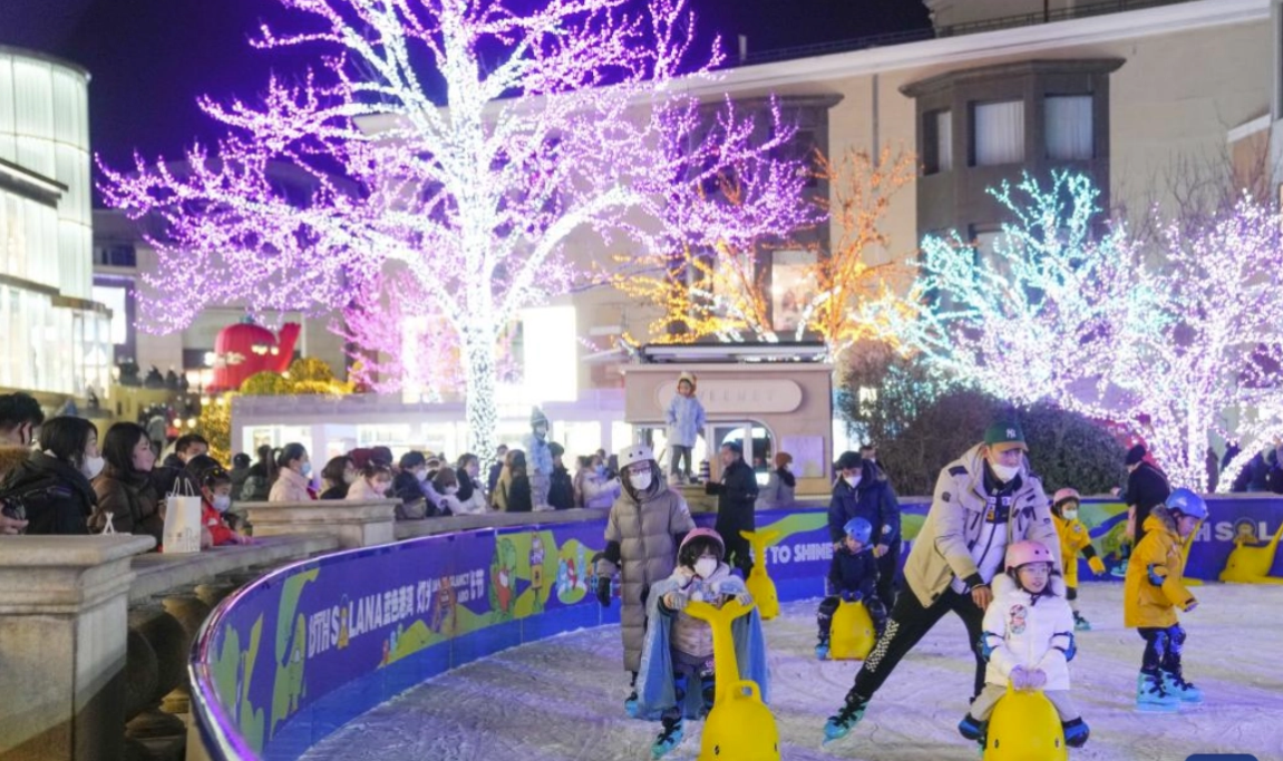 Business areas in Beijing have resumed bustle. Children skate at a business center in Beijing, Dec. 24, 2022.
