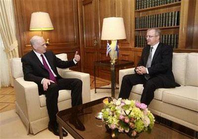 Greek&nbsp;Prime&nbsp;Minister&nbsp;George&nbsp;Papandreou&nbsp;(L)&nbsp;meets&nbsp;EU&nbsp;Economic&nbsp;Affairs&nbsp;Commissioner&nbsp;Olli&nbsp;Rehn&nbsp;in&nbsp;Athens&nbsp;March&nbsp;1,&nbsp;2010.&nbsp;REUTERS/John&nbsp;Kolesidis