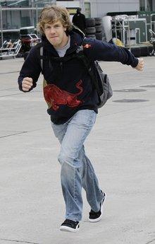 Red&nbsp;Bull&nbsp;Formula&nbsp;One&nbsp;driver&nbsp;Sebastian&nbsp;Vettel&nbsp;of&nbsp;Germany&nbsp;runs&nbsp;down&nbsp;he&nbsp;F1&nbsp;Paddock&nbsp;on&nbsp;his&nbsp;arrival&nbsp;at&nbsp;the&nbsp;Shanghai&nbsp;International&nbsp;Circuit&nbsp;for&nbsp;the&nbsp;the&nbsp;Chinese&nbsp;Formula&nbsp;One&nbsp;Grand&nbsp;Prix&nbsp;in&nbsp;Shanghai,&nbsp;China,&nbsp;Thursday,&nbsp;April&nbsp;15,&nbsp;2010.