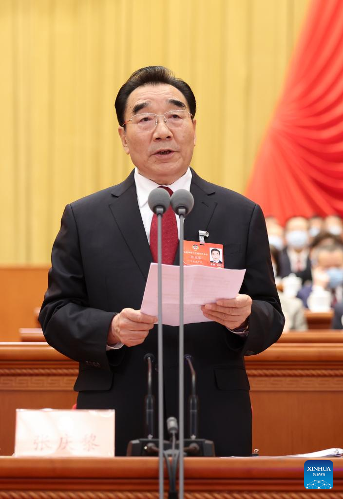 Zhang Qingli presides over the opening meeting of the fifth session of the 13th National Committee of the Chinese People’s Political Consultative Conference (CPPCC) at the Great Hall of the People in Beijing, capital of China, March 4, 2022. (Xinhua/Huang Jingwen)